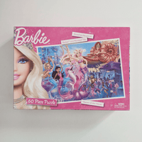 Barbie puzzle box with underwater illustration on a white background