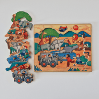 Wooden puzzle with animal-themed pieces on a white background