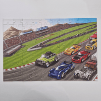 Jigsaw puzzle of a race track with colorful cars on a white background