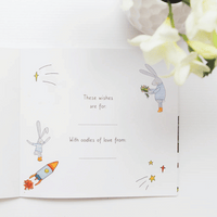 This Book belongs to page with illustrations of a rabbit and rocket, and text on a white background.