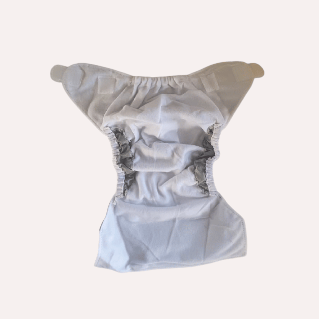 Newborn reusable cloth nappy suede lining on a white background