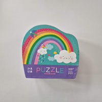 Children's puzzle box with a colourful rainbow design on a white background