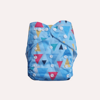 Blue reusable cloth nappy with colourful triangle pattern on a light grey background