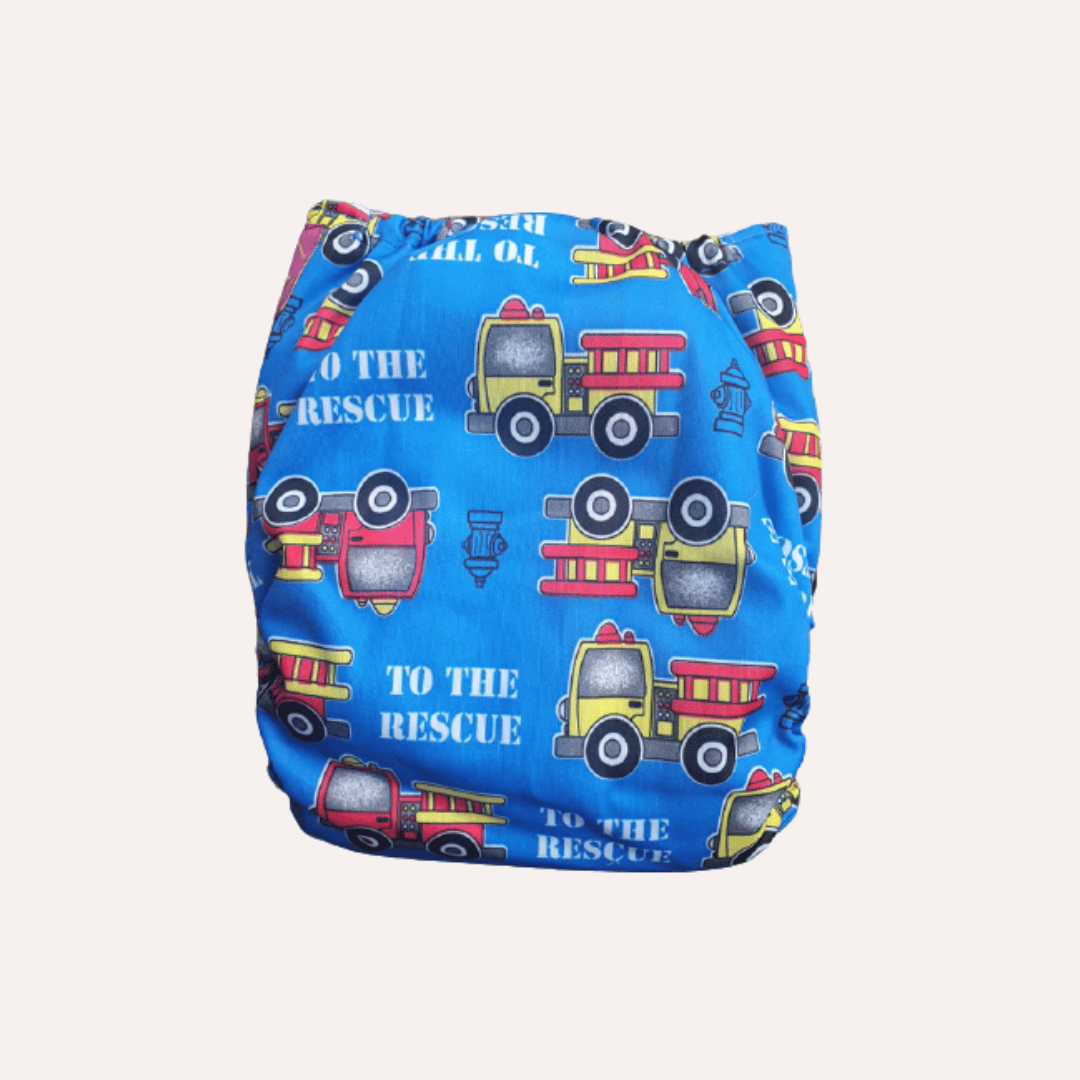 Blue reusable cloth nappy with fire truck pattern and 'To the Rescue' text on a white background