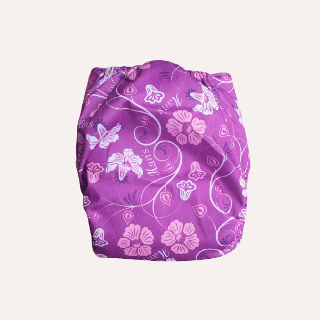 Purple reusable cloth nappy with floral pattern on a white background
