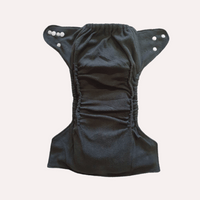 Charcoal bamboo cloth nappy lining on a white background