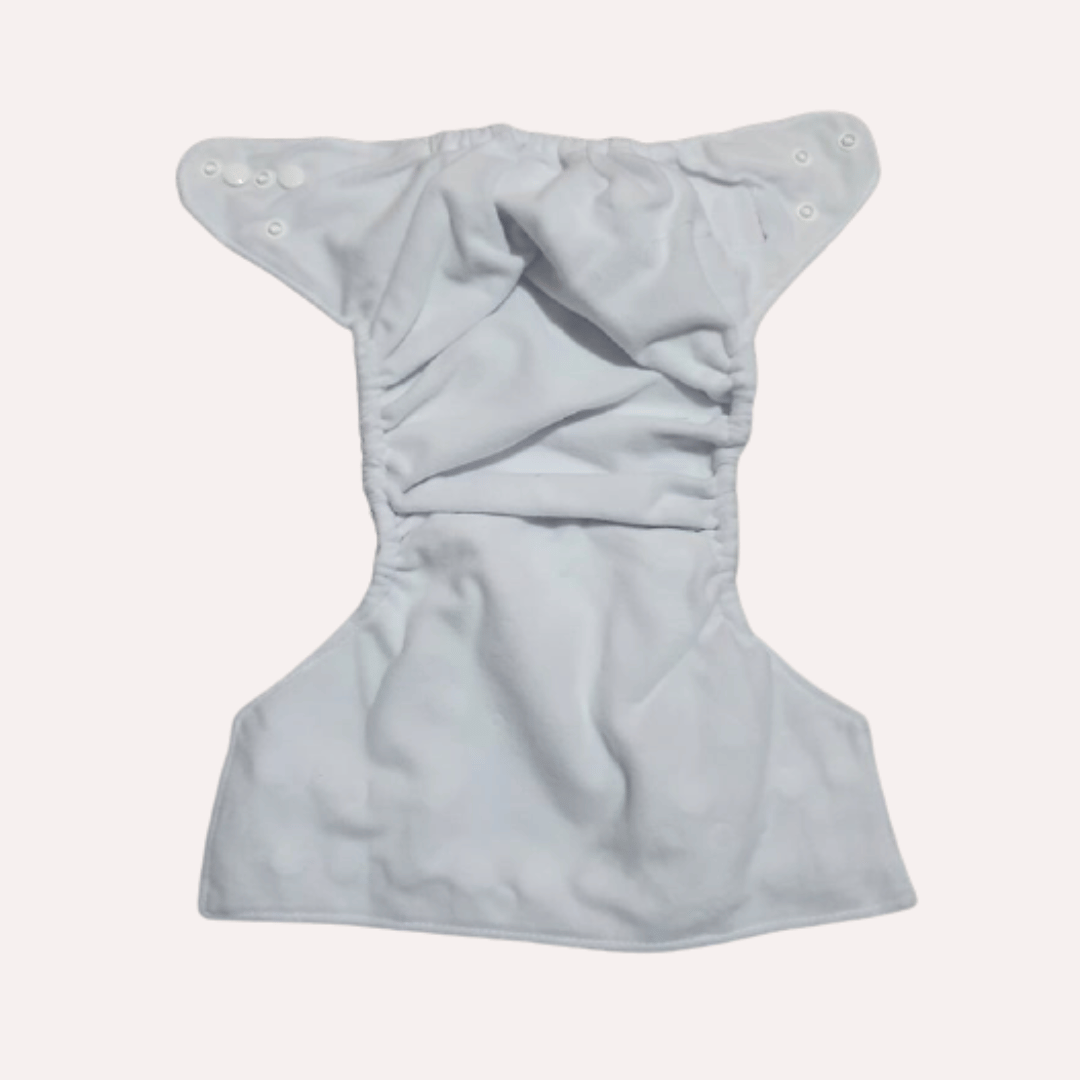 Suede lining on reusable cloth nappy on a white background