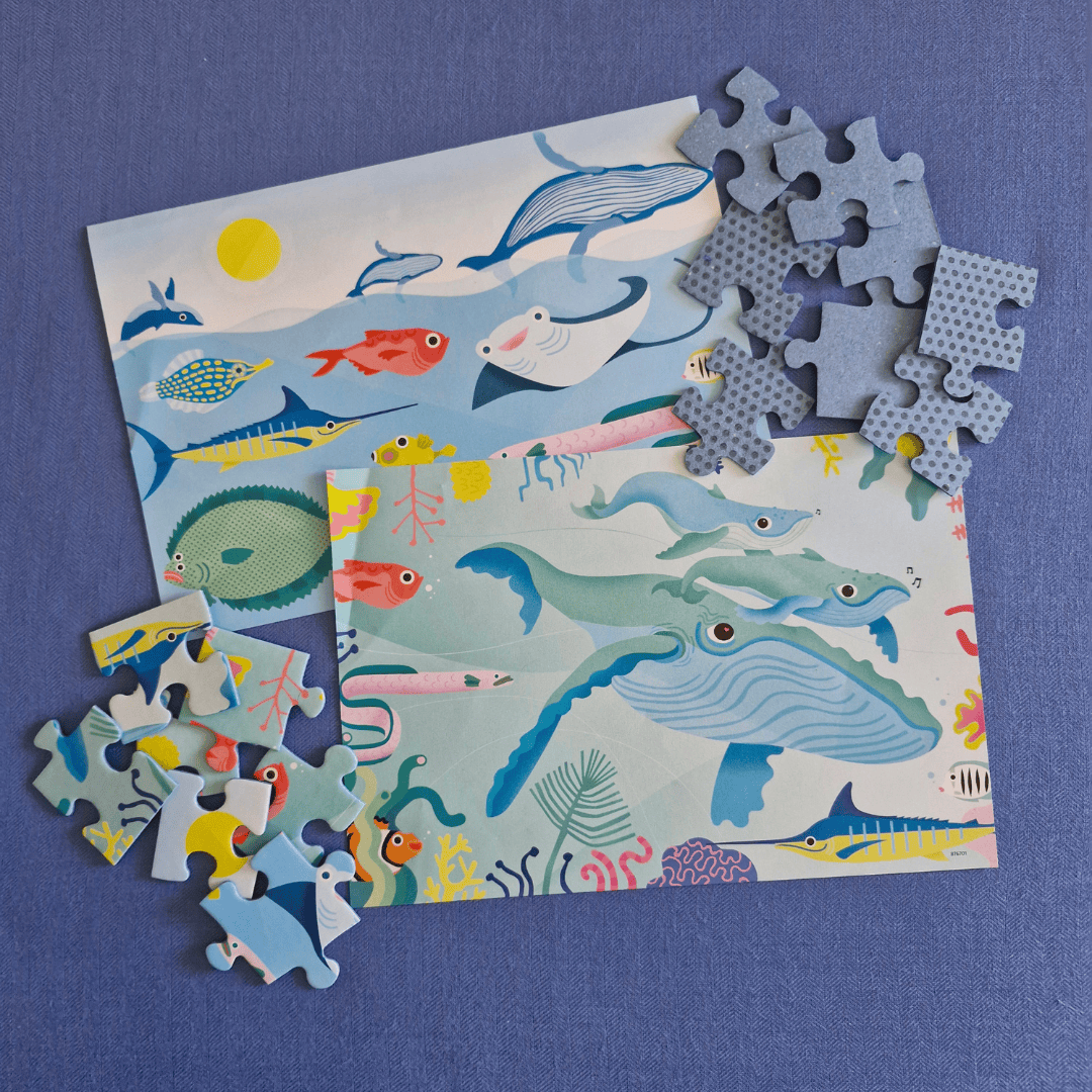 Children's puzzle with ocean-themed illustrations on a blue background