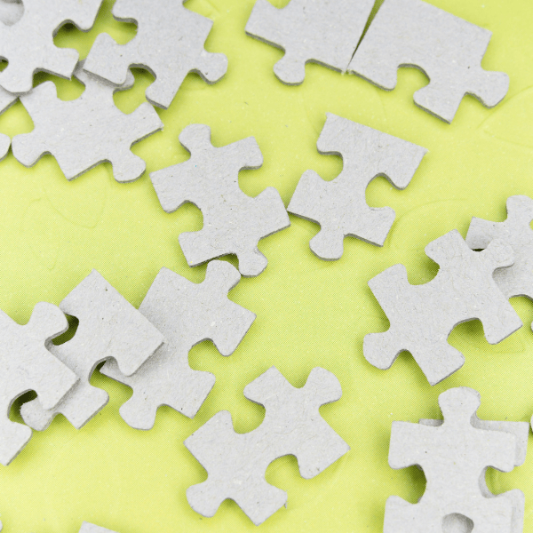 Puzzle pieces on a yellow background