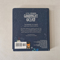 Back cover of a book titled 'Goodnight Ocean' by Little Explorers on a beige surface.
