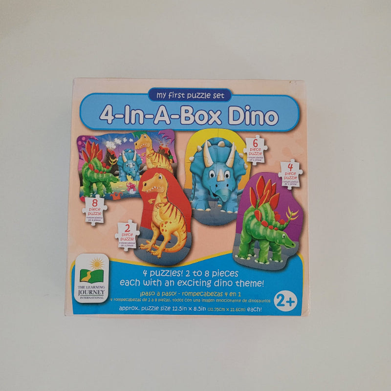 Box title 4-In-A-Box Dino puzzle set
