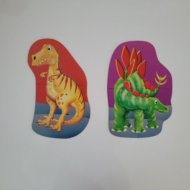 Two dinosaur-shaped puzzles on a plain background