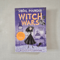 Book titled 'Witch Wars' by Sibéal Pounder on a textured surface