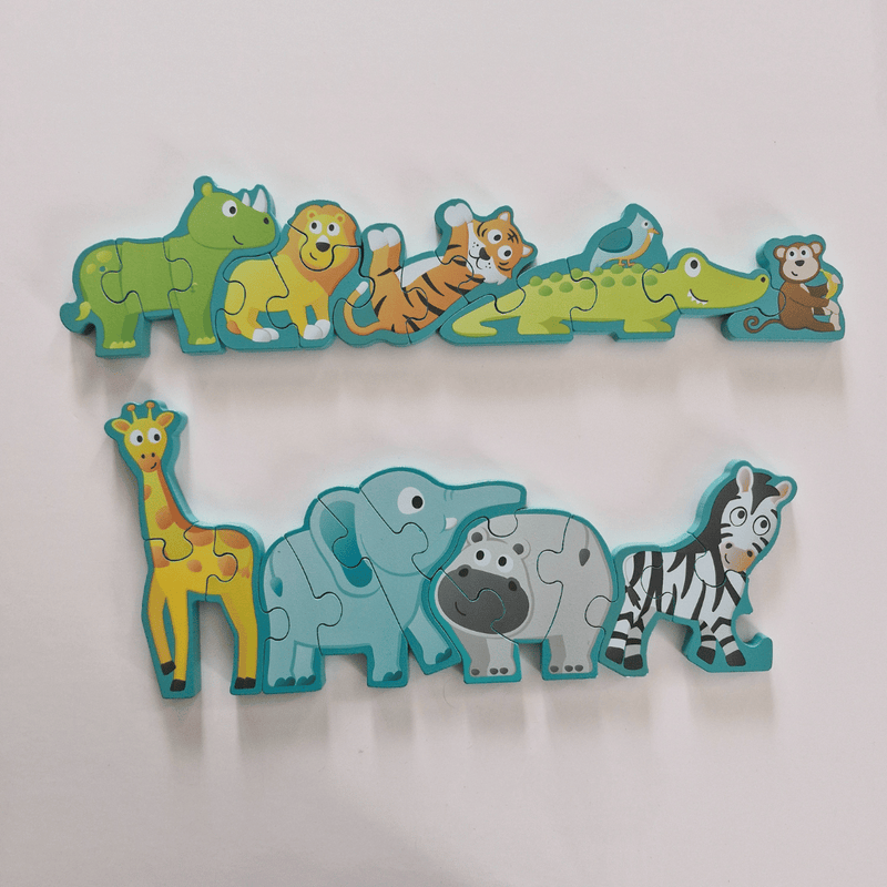 Set of colorful animal-shaped puzzle pieces on a white background