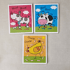 Three colourful children's puzzles with animal illustrations on a textured surface.