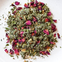 A scoop of Anxiety tea blend on a white background