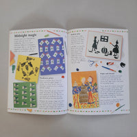 Open book with story illustrations and text on a gray background