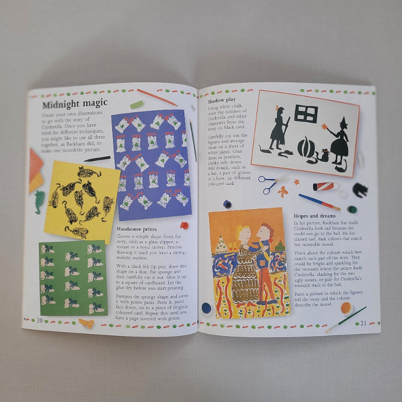 Open book with story illustrations and text on a gray background