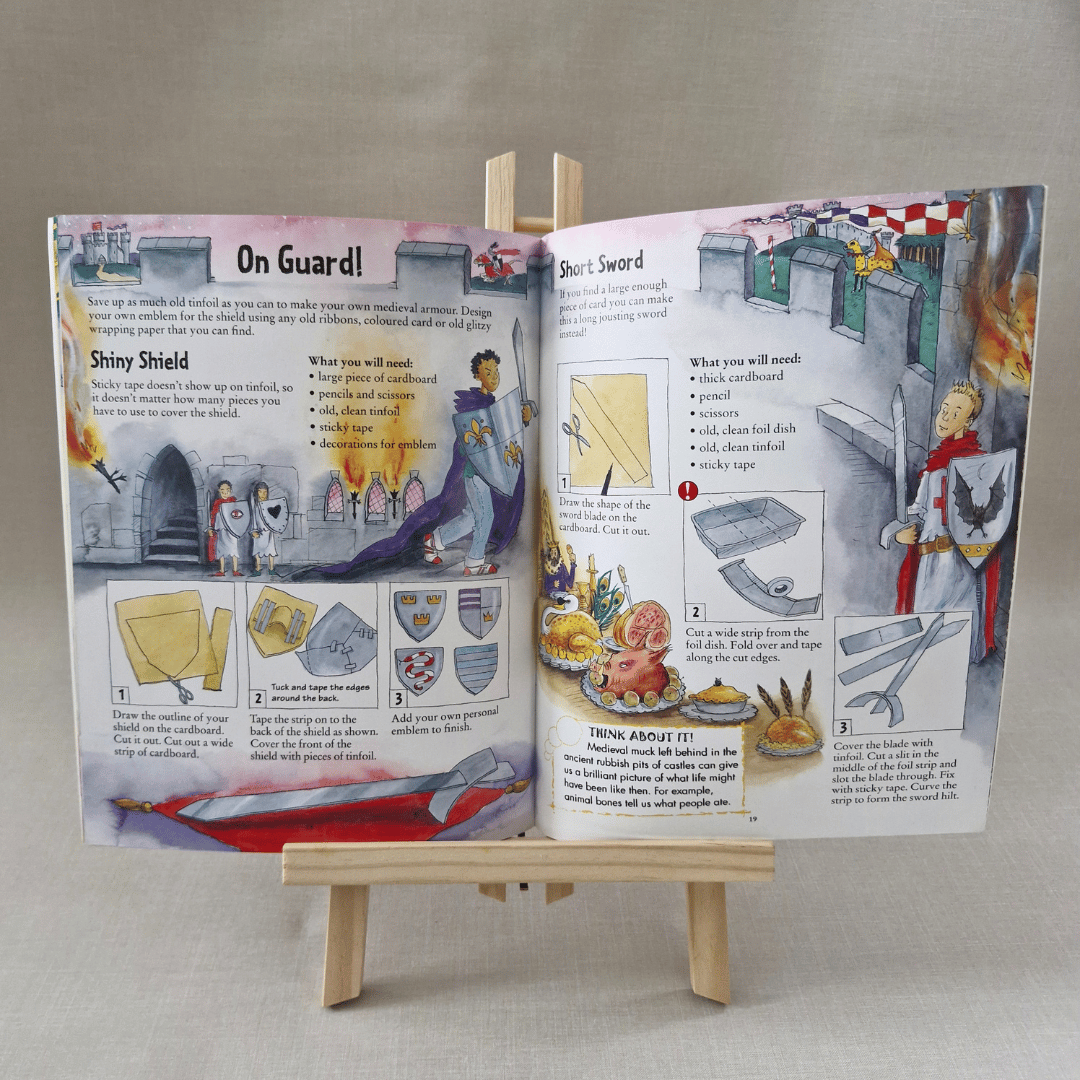 Open book with medieval-themed activities on a small wooden easel against a neutral background