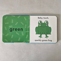 Children's card with a green frog illustration and text on a gray background