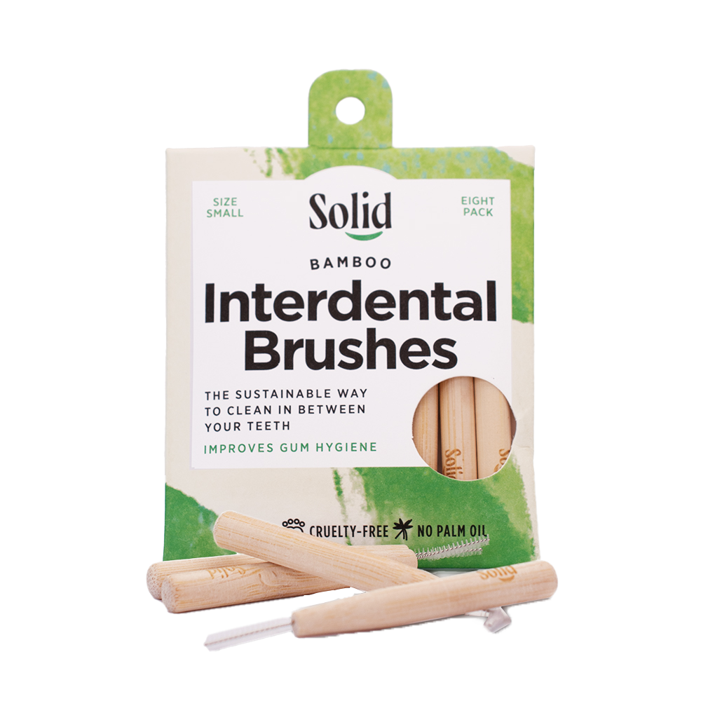 Pack of Solid Bamboo Interdental Brushes with packaging on a white background