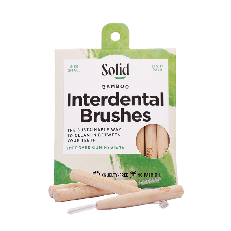 Pack of Solid Bamboo Interdental Brushes with packaging on a white background
