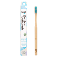 Bamboo toothbrush with packaging labeled 'Solid' on a white background