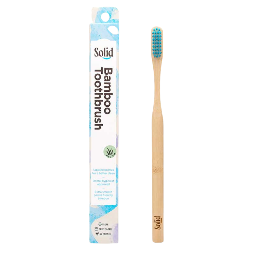 Bamboo toothbrush with packaging labeled 'Solid' on a white background