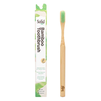 Bamboo toothbrush with packaging on a white background