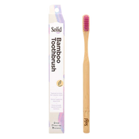 Bamboo toothbrush with packaging on a white background
