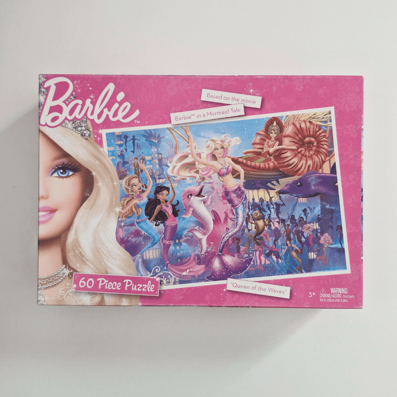 Barbie puzzle box with underwater illustration on a white background