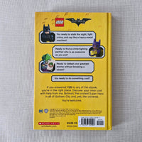 Back of a LEGO Batman toy box with text and graphics on a gray background