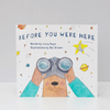 Book cover of 'Before You Were Here' with a bear holding binoculars and space-themed illustrations.