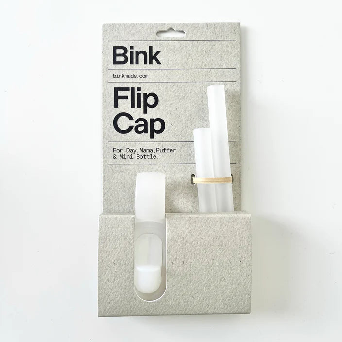 Bink Flip Cap packaging with cap and two silicone straws on a white background