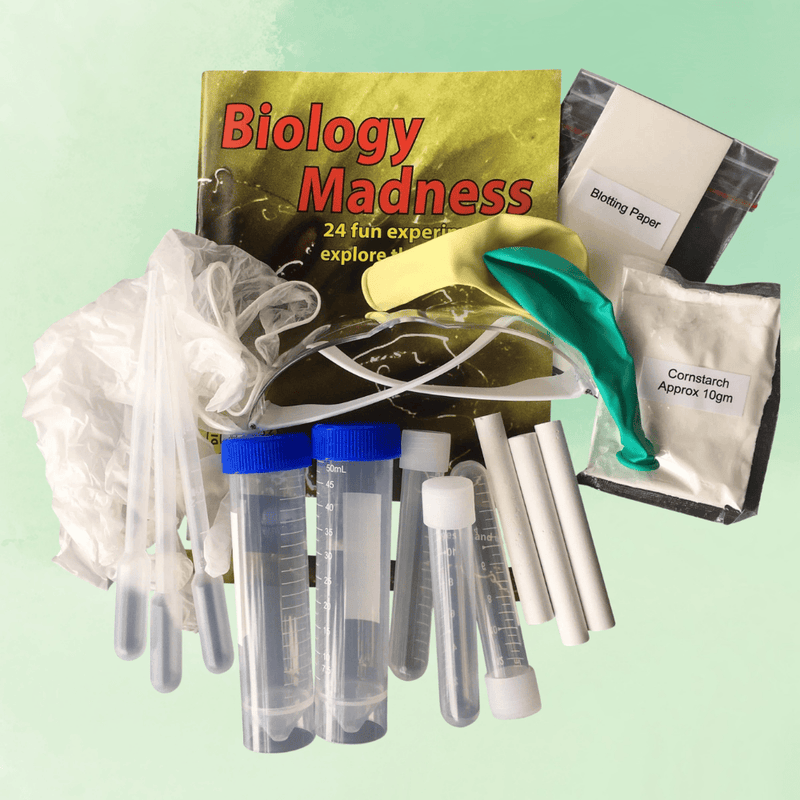 Biology Madness kit with test tubes, blotting paper, and other supplies on a light green background