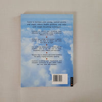 Book cover with blue sky and cloud design on a beige background
