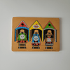 Vintage 'Thomas the Tank Engine' toy puzzle with three trains in different colored houses on a beige background.