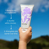 Hand holding a tube of 'Noody' cream with instructions on a blue background
