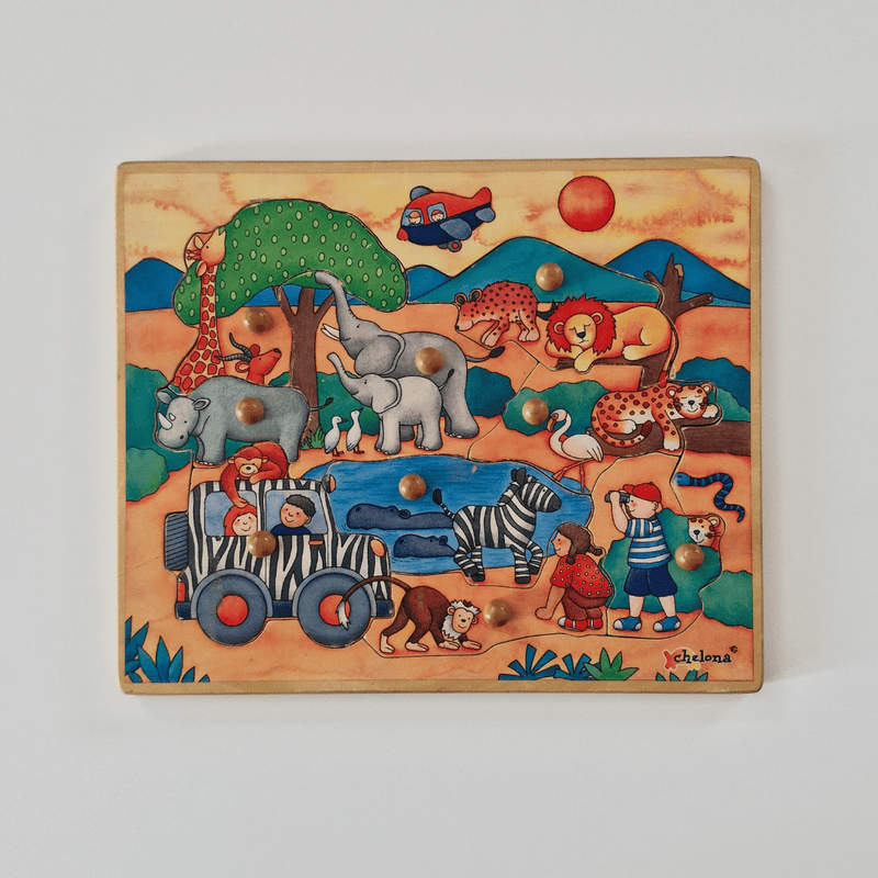 Wooden puzzle with colorful illustration of animals and children in a safari setting.