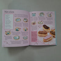 Open book with illustrations of mini eclairs and text on a pink background