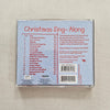 Back cover of a ChristmasSing-Along CD on a textured beige surface