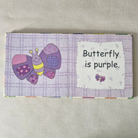 Purple butterfly-themed book page with a label on a beige background
