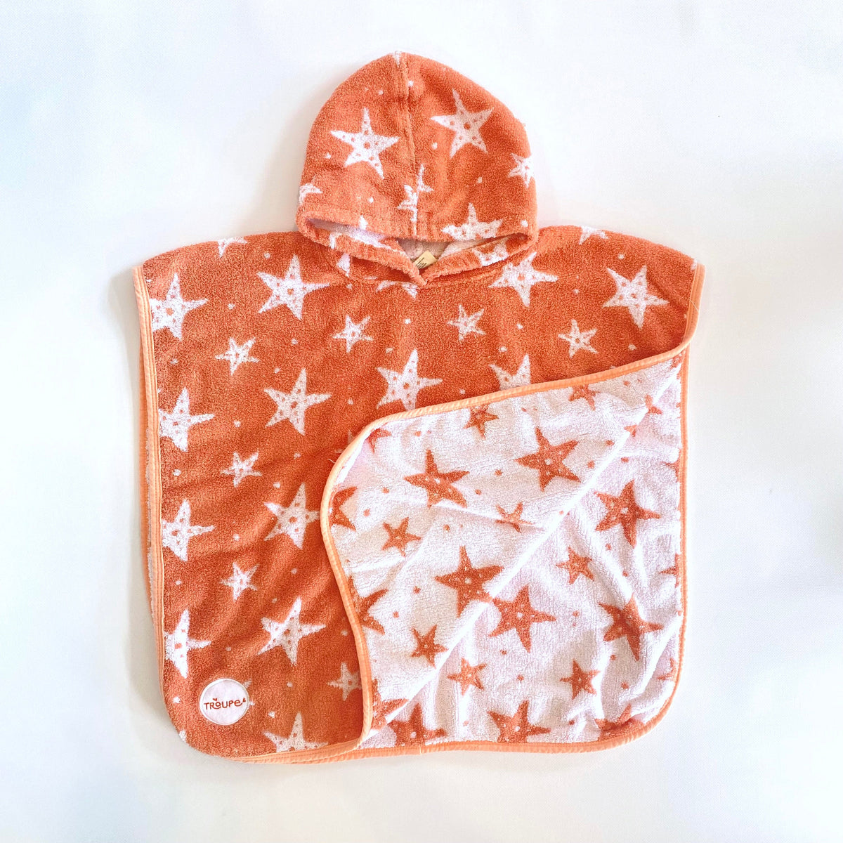 Cotton hooded towel with coral orange and white starfish pattern
