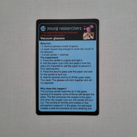 Card with text about vacuum science experiment and a small illustration on a gray background