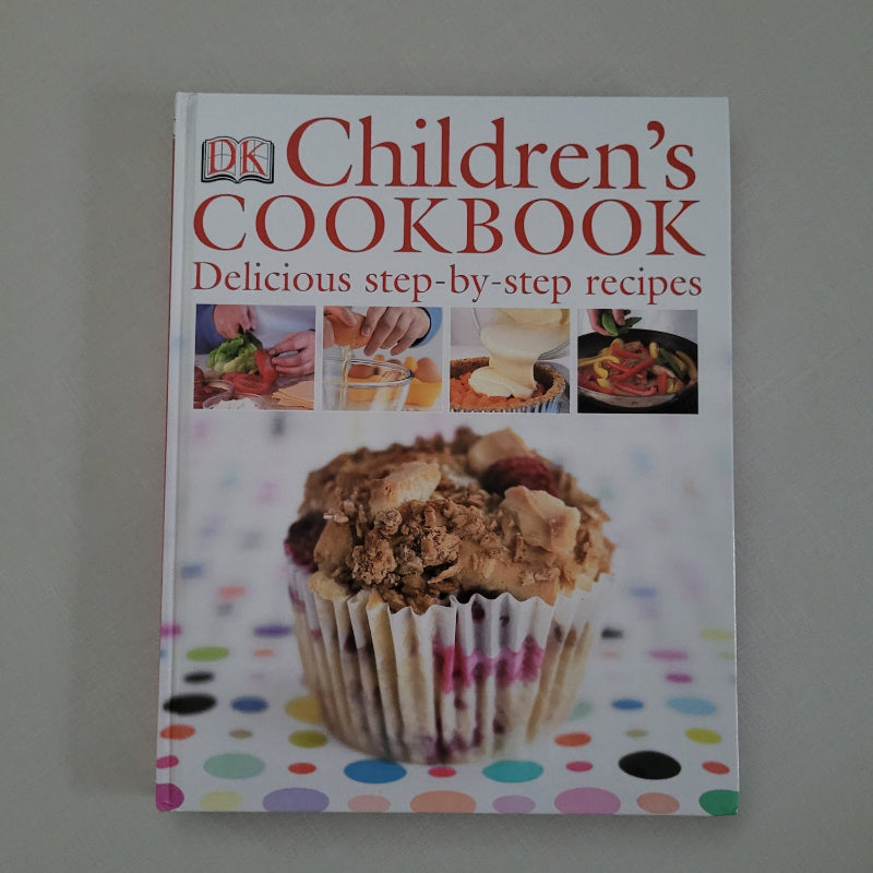 Children's cookbook with a muffin on the cover against a light gray background