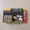 Dinosaur explorer excavation kit packaging on a beige surface