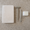 Plaster excavation block with chisel tools and sponge