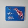 Dinosaur-themed puzzle with clear pieces on a blue base, featuring the brand 'Crocodile Creek'.