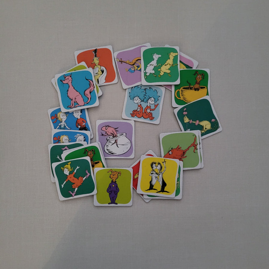 Collection of colourful children's cards with cartoon characters on a light gray background