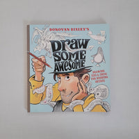Book titled 'Draw Some Awesome' with a character holding a pencil on a light blue background.